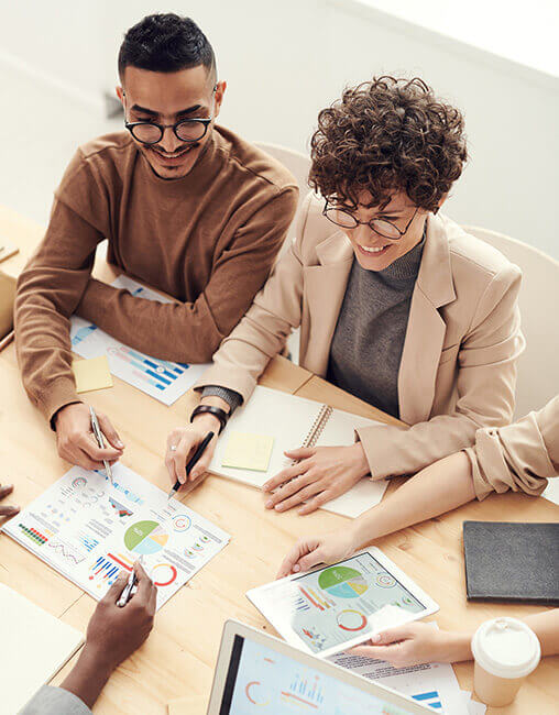 Professional movers packing a living room